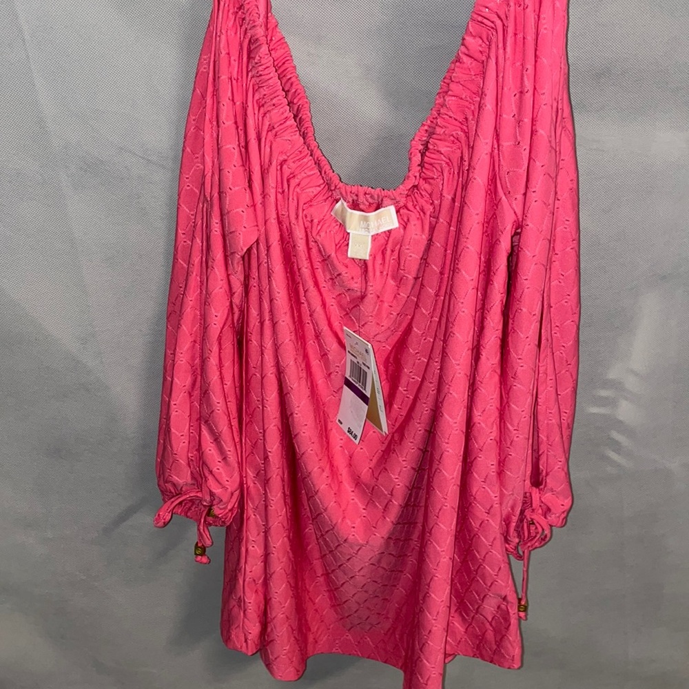 Michael Cole, pink after shoulder top
